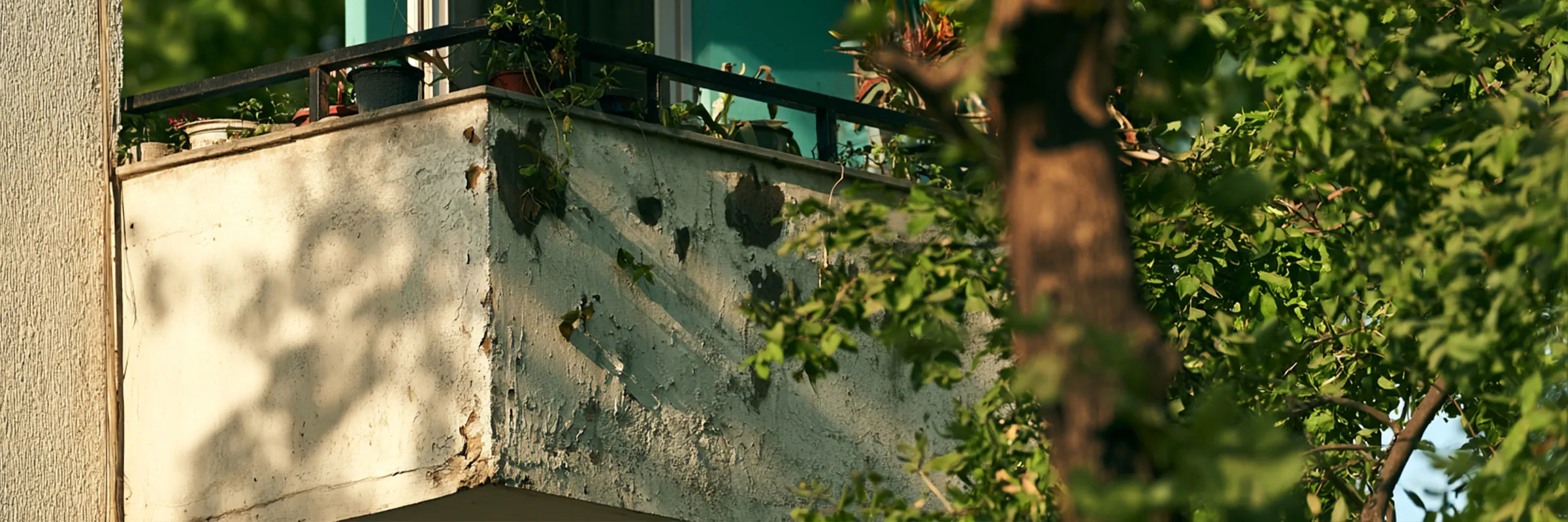 Structural detailing on a building exterior, representative of balcony slab and junction conditions